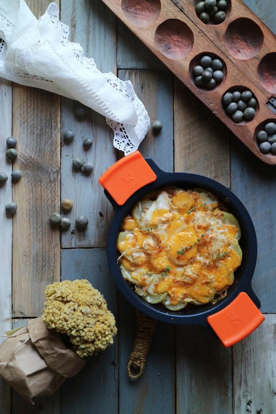 Patatas gratinadas con panceta ibérica y pisto